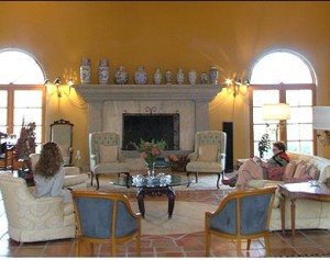 The living room, as are all the rooms in the main house, is built on a grand scale, yet manages to be comfy and inviting.