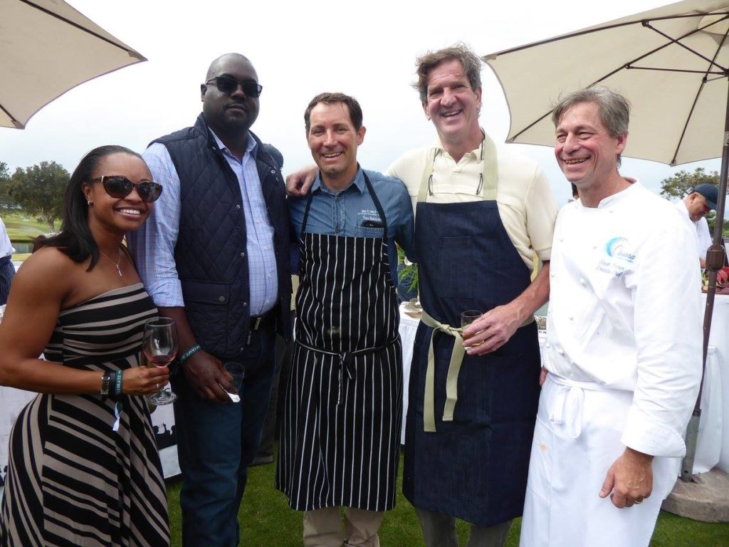 Chef Jeff Jackson,flanked by Chefs Tim Kolanko and Steven Reimer and greet a pair of guests